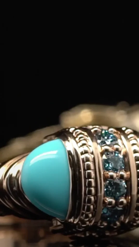 Turquoise and diamond ring on black background.